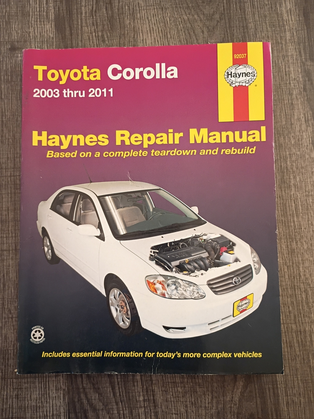 Hanes Repair Manual Cover - White Car with Purple Background